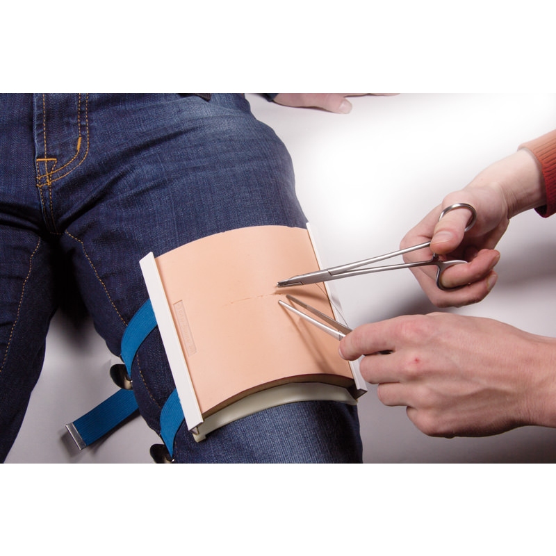 Pritrdilni sistem za trenažer šivanja